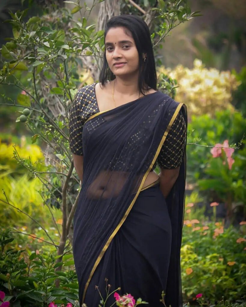 Sowmya Shetty's Hot Nave Show in transparent black saree